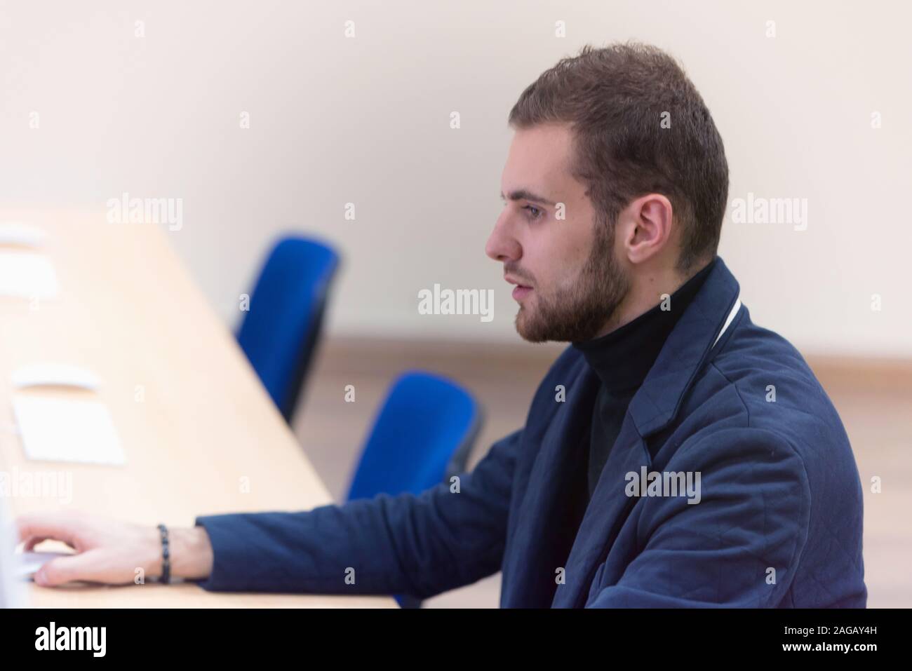 Programming. Man Working On Computer In IT Office, Sitting At Desk Writing Codes. Programmer Typing Data Code, Working On Project In Software Developm Stock Photo