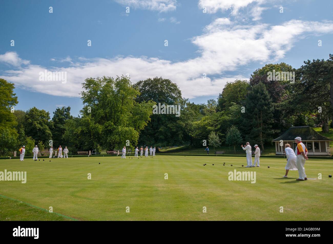 Bowlers playing Crown Green Bowls at the local bowling club in Alexandra park, Hastings, East Sussex, UK Stock Photo
