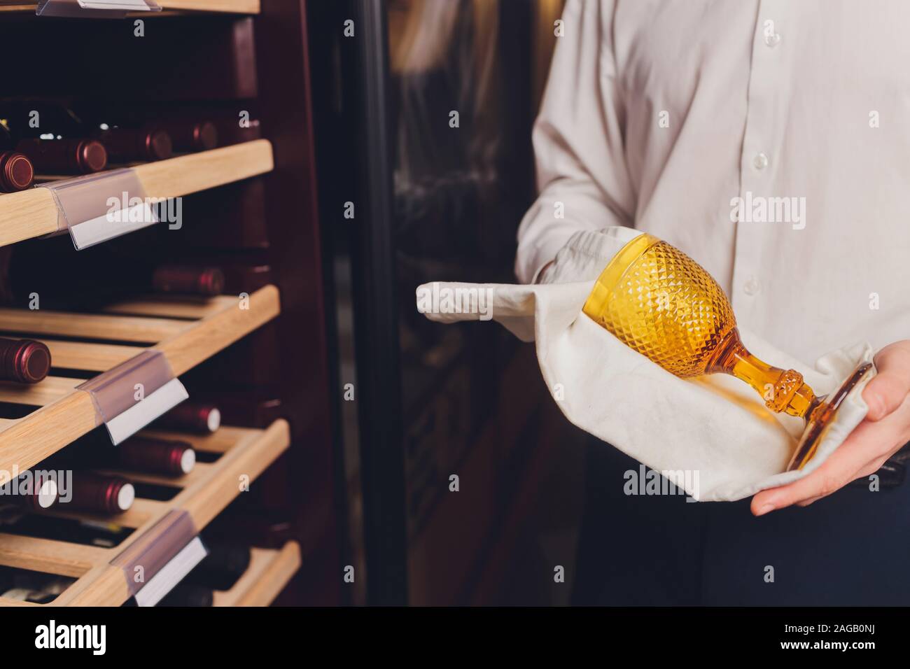 Storing bottles of wine in fridge. Alcoholic card in restaurant