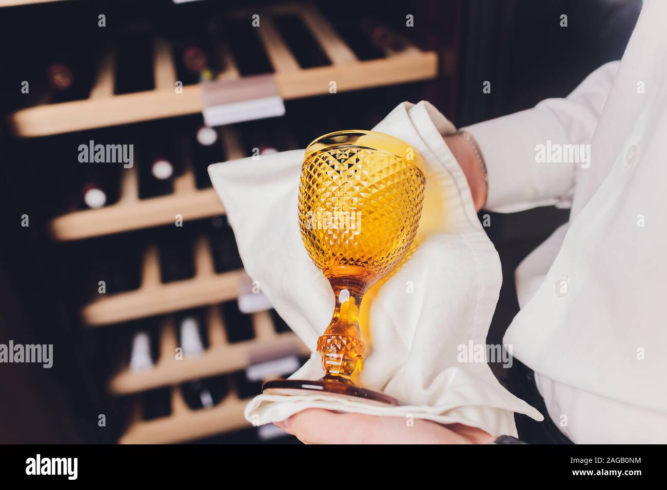 Storing bottles of wine in fridge. Alcoholic card in restaurant