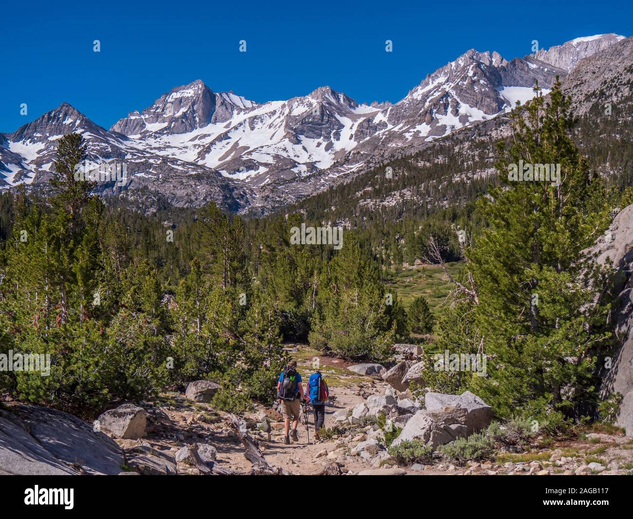 Climbers hike the Lakes Valley Trail, John Muir Wilderness, Inyo National Forest, California. Stock Photo