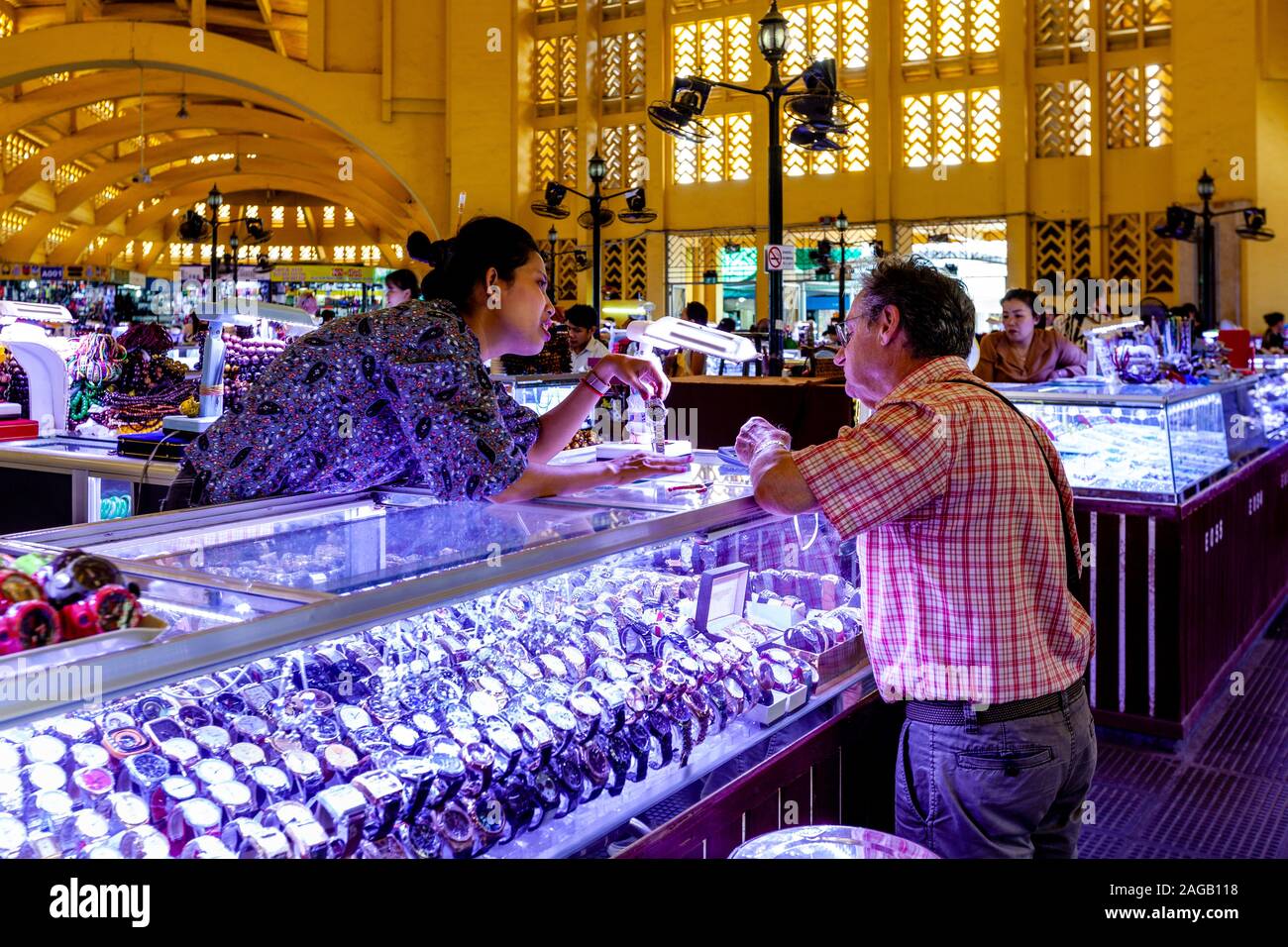 A Tourist Buying A Watch At The Central Market, Phnom Penh, Cambodia. Stock Photo