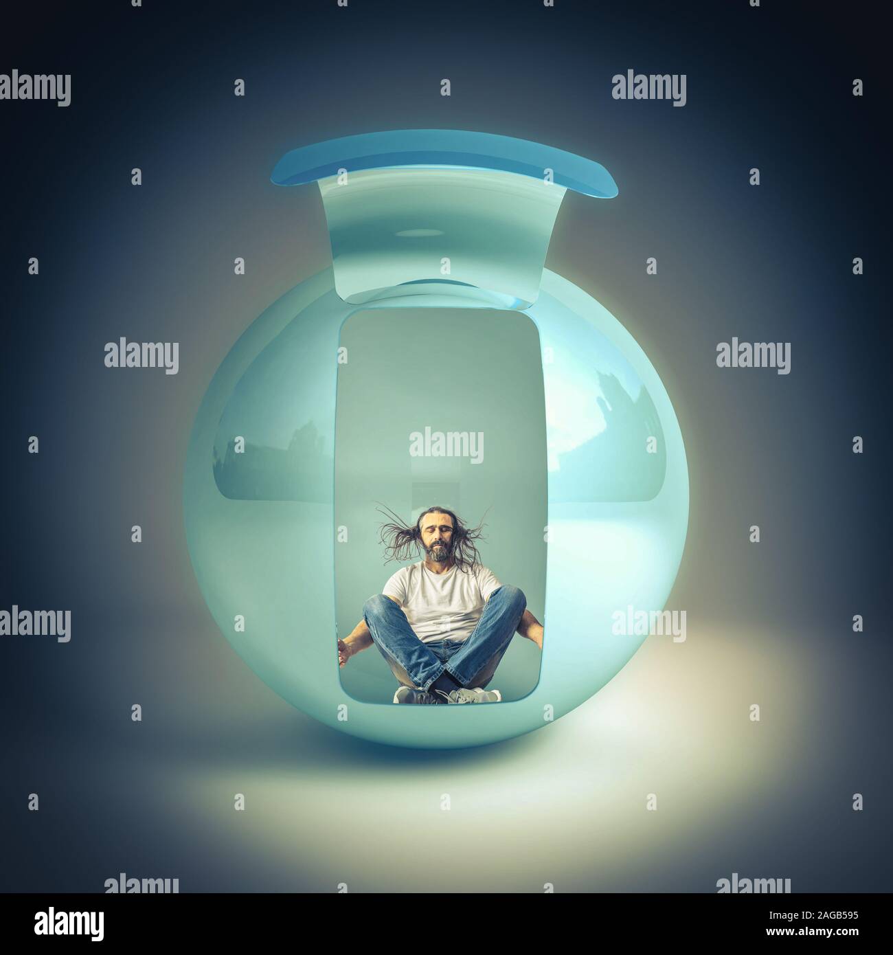 man with long hair sitting inside a sphere meditates with his eyes closed. comfort zone concept. Stock Photo