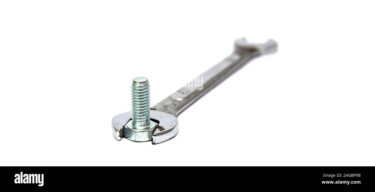 Wrench and bolt isolated on a white background Stock Photo Alamy