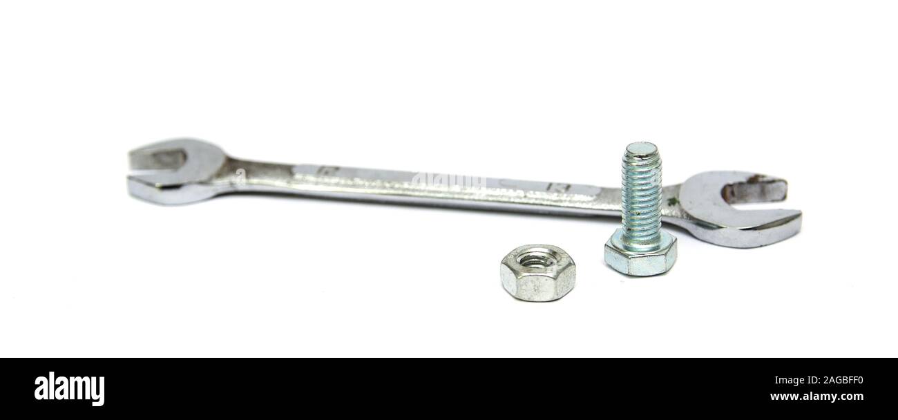 Wrench and bolt isolated on a white background Stock Photo - Alamy