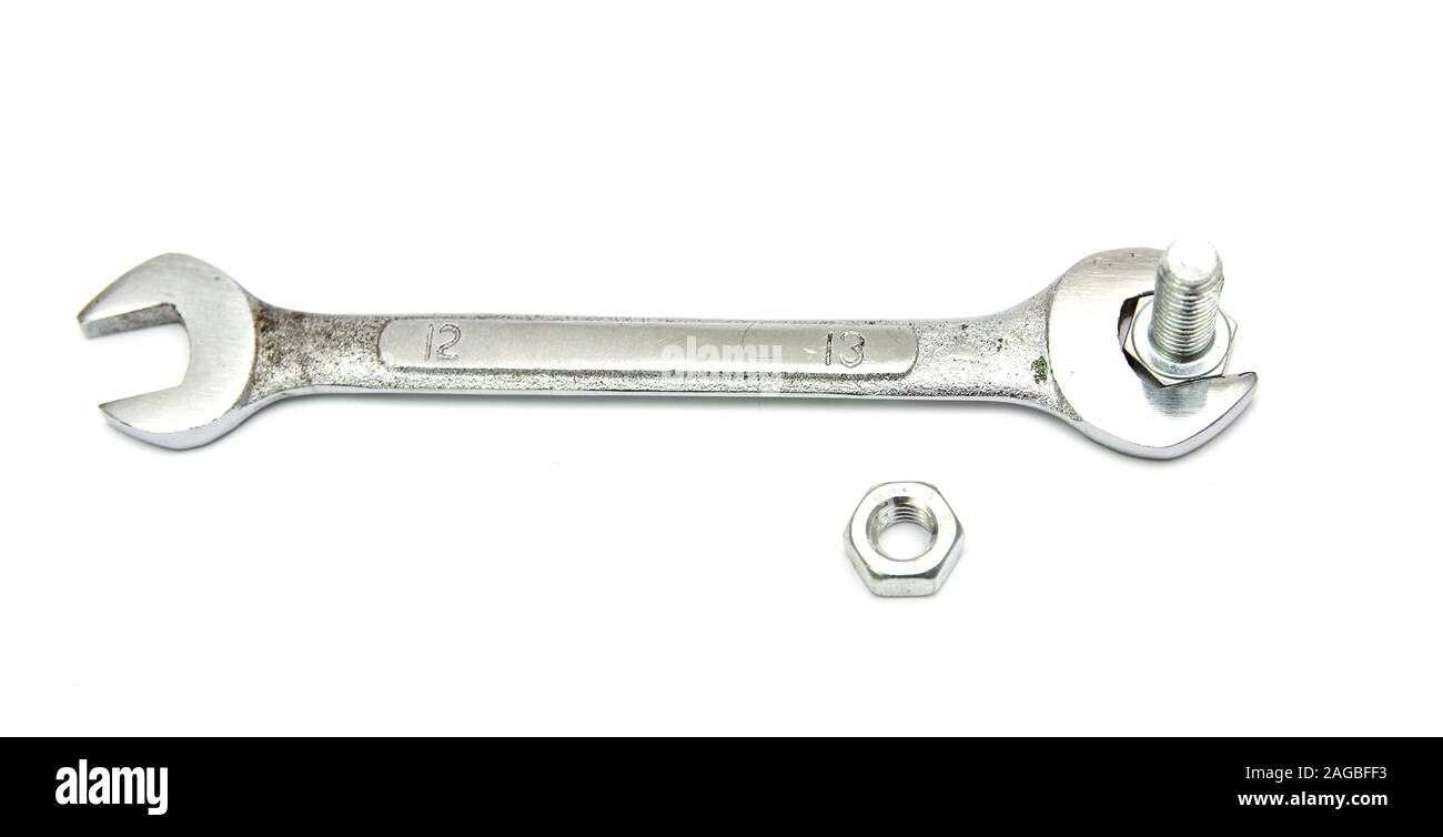 Wrench and bolt isolated on a white background Stock Photo - Alamy