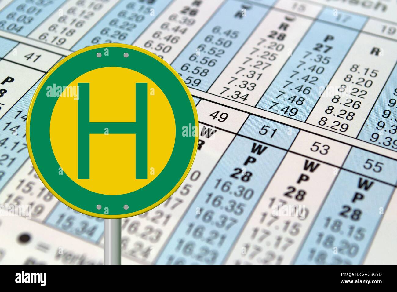 Bus stop sign and timetable Stock Photo Alamy