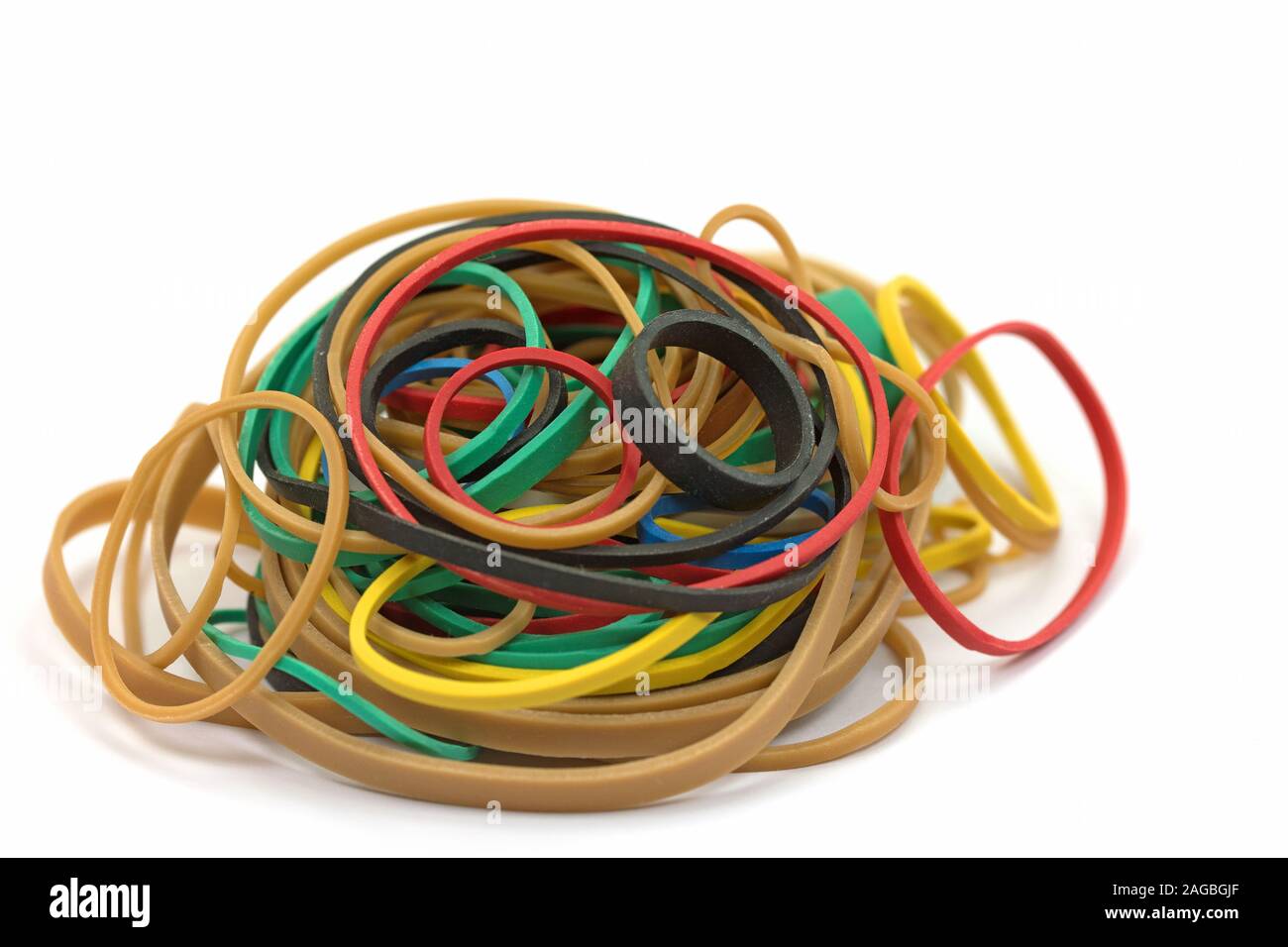 Many colorful rubber bands against a white background Stock Photo