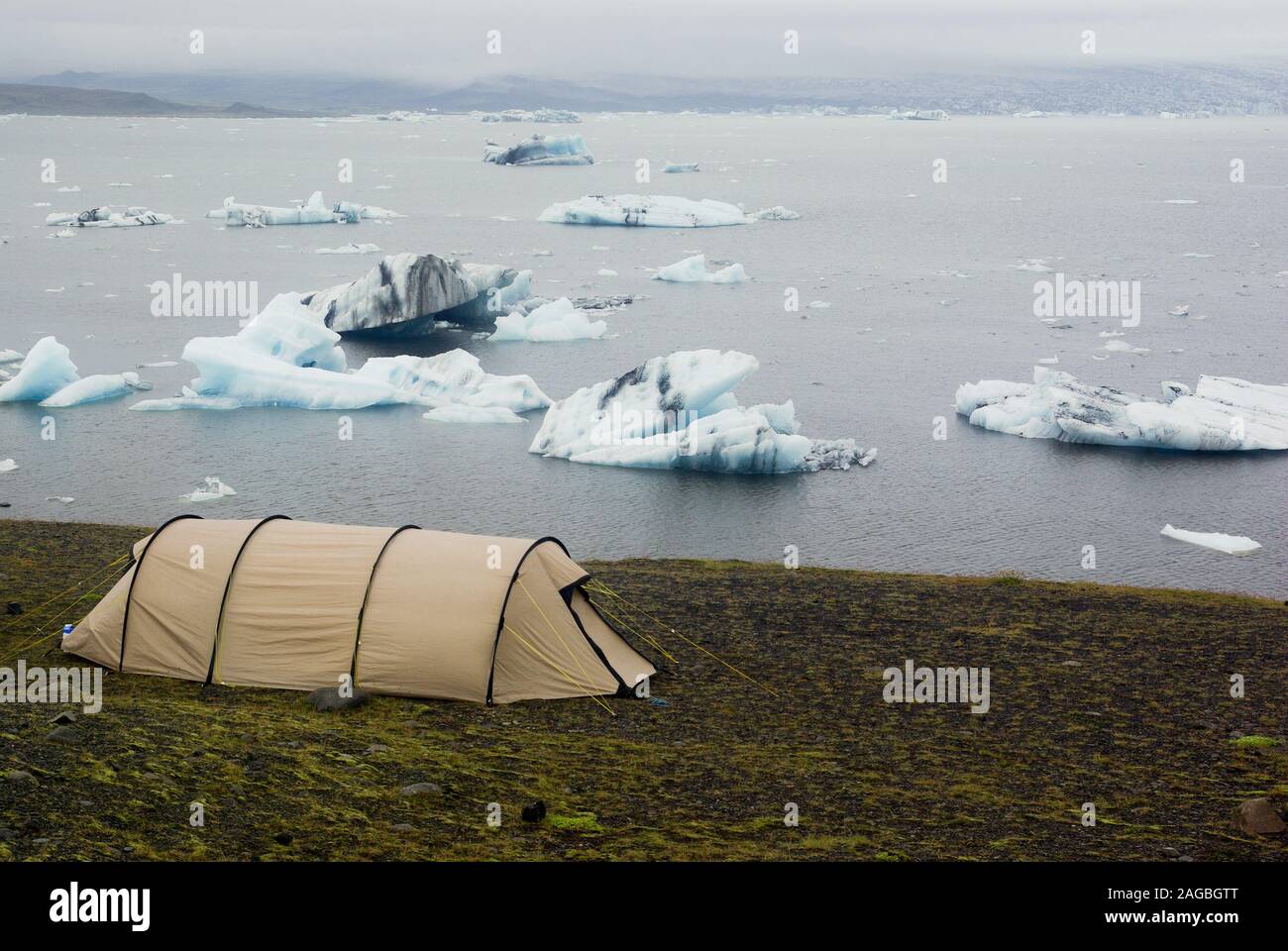 tents in front of glacial lake Iceland Stock Photo