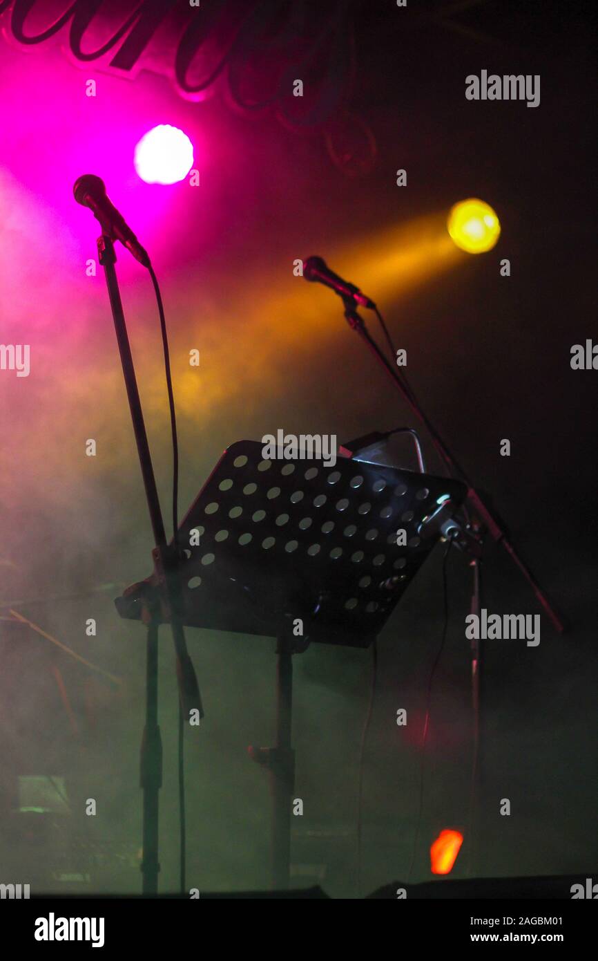 music stand and microphone at concert stage Stock Photo