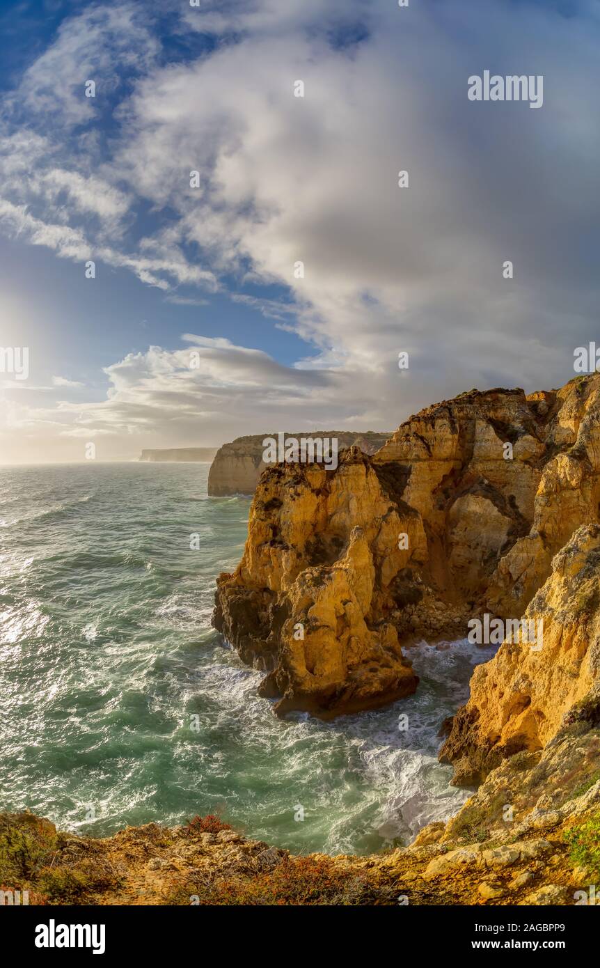 Vertical Picture Of Rocks Around The Sea Under A Cloudy Sky In Portugal Algarve Stock Photo Alamy Vertical Picture Of Rocks Around The Sea Under A Cloudy Sky In Portugal Algarve Stock Photo Alamy