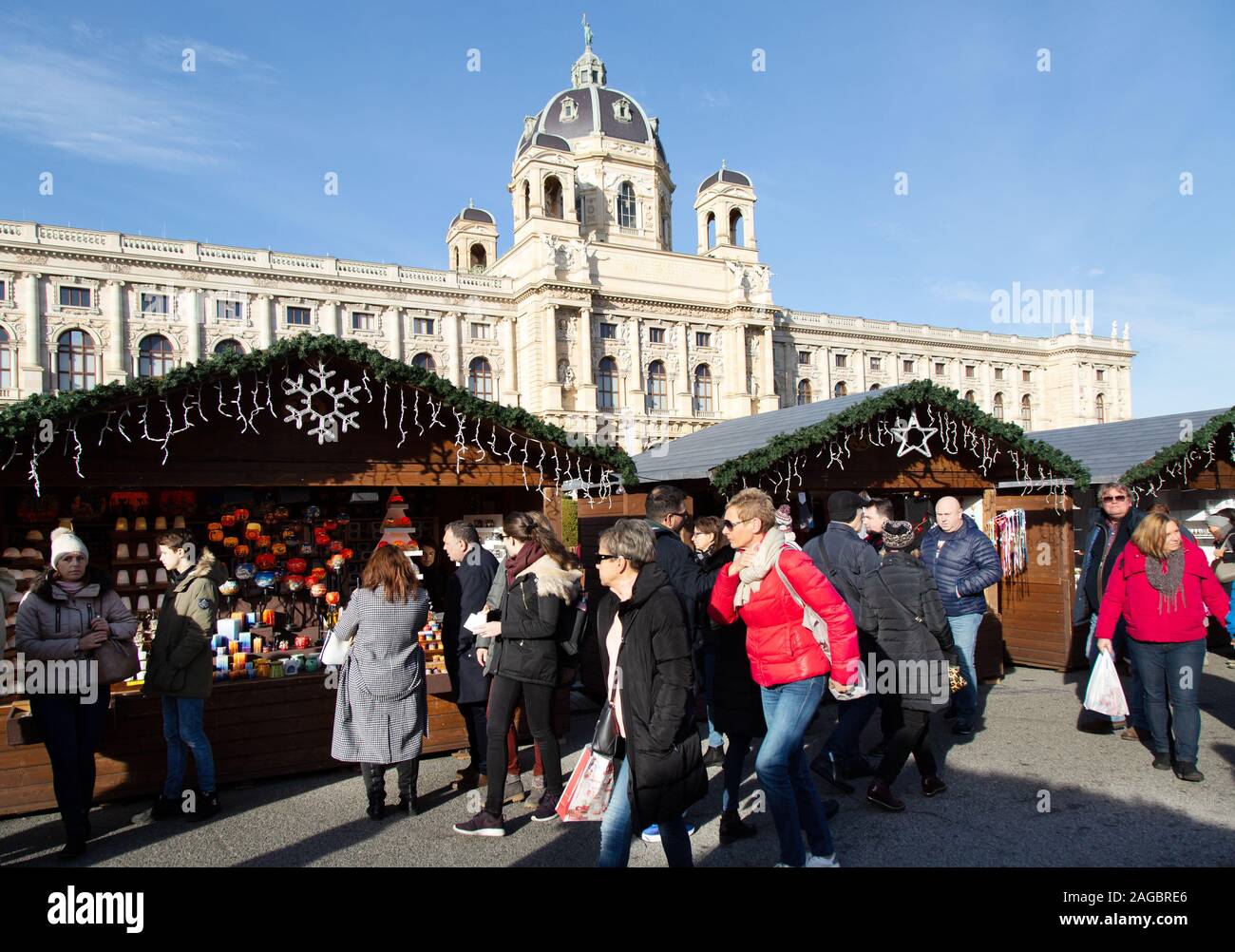 Vienna Christmas market; people shopping in daytime at the market in Maria Theresien Platz, outside the Natural History Museum, Vienna Austria Europe Stock Photo