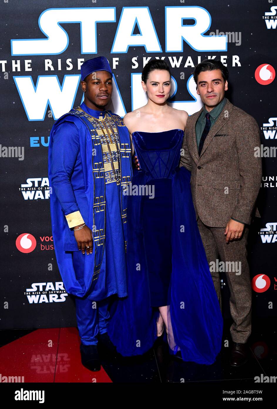 John Boyega, Daisy Ridley and Oscar Isaac (right) attending the Star Wars: The Rise of Skywalker Premiere at Cineworld, Leicester Square, London. Stock Photo