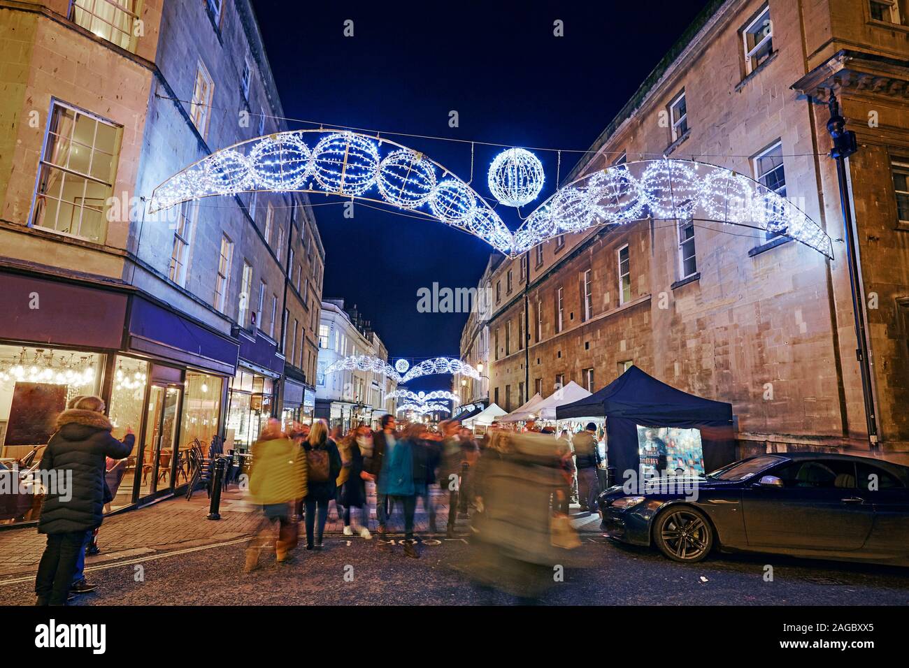 Christmas market decorated stalls and shops in the centre of Bath Spa