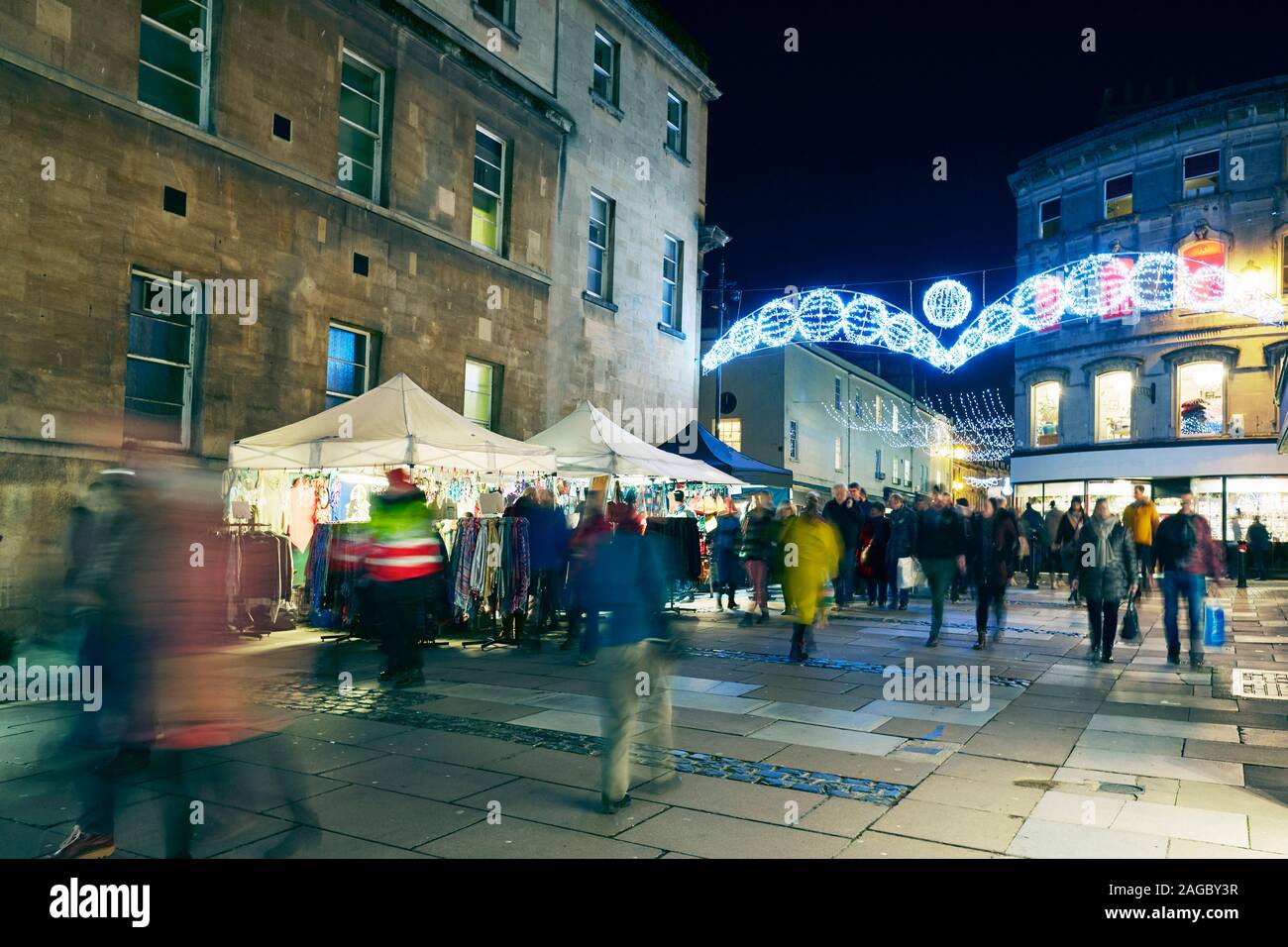 Christmas market decorated stalls and shops in the centre of Bath Spa
