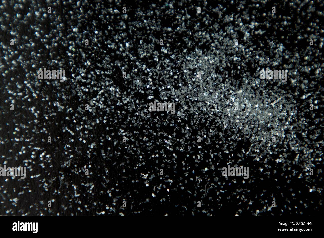 Abstract background glitter snow on black surface Stock Photo - Alamy