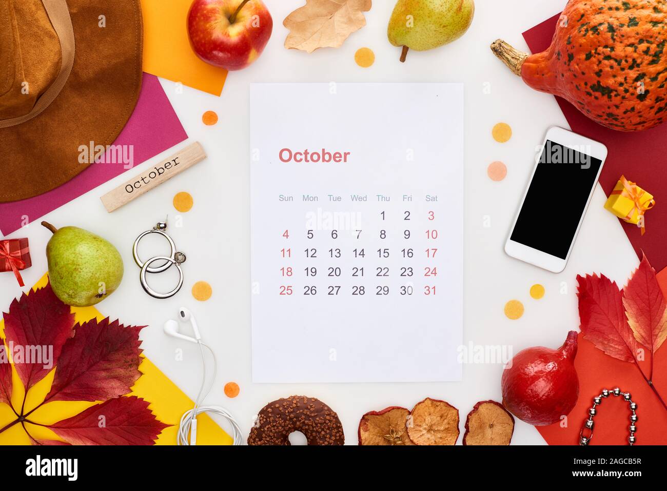 october calendar page hat smartphone fruits pumpkin dry leaves october calendar page hat smartphone fruits pumpkin dry leaves