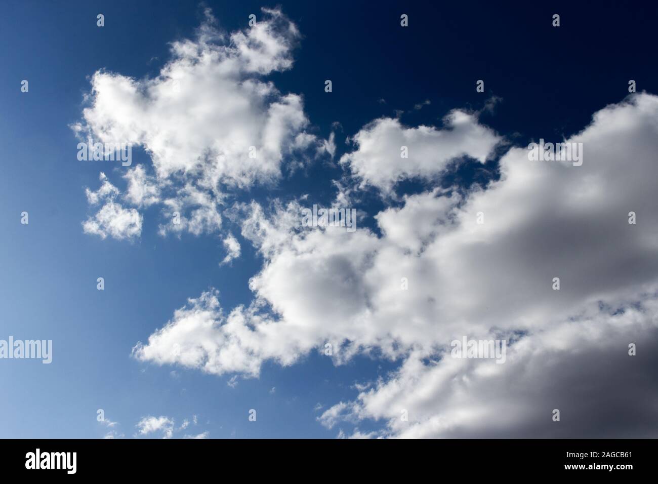 Dark Evening Sky With White Clouds Twilight Blue Sky With Puffy Cumulus Clouds Heavenly Landscape Background Wallpaper Backdrop Texture Empty Sky Stock Photo Alamy