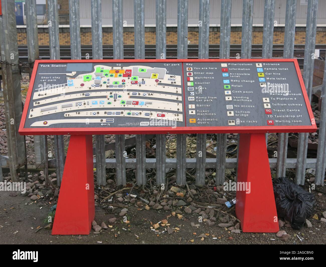 A tactile wayfinding guide and map of York Railway Station with braille