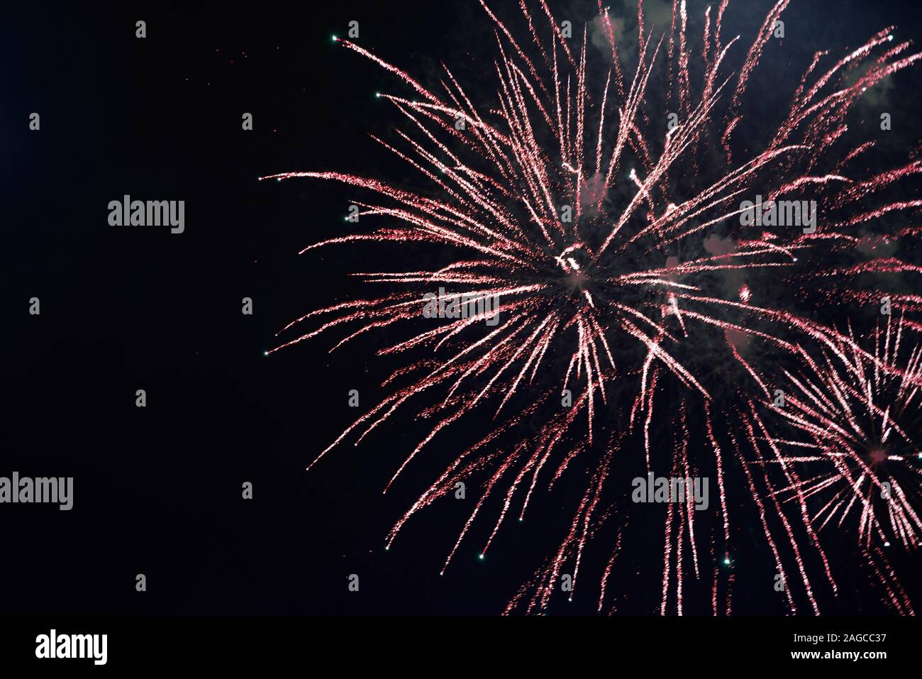 Firework lights over dark background Stock Photo