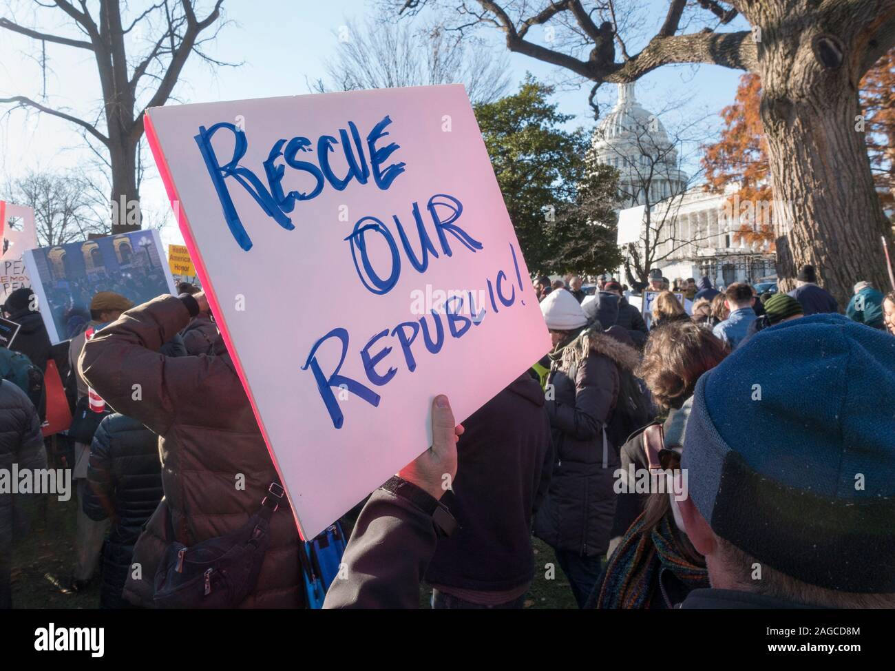 WASHINGTON, DC - DEC. 18, 2019: Some of hundreds at rally to support the impeachment of President Donald Trump at the U.S. Capitol on day of House of Representatives vote on articles of impeachment. Stock Photo