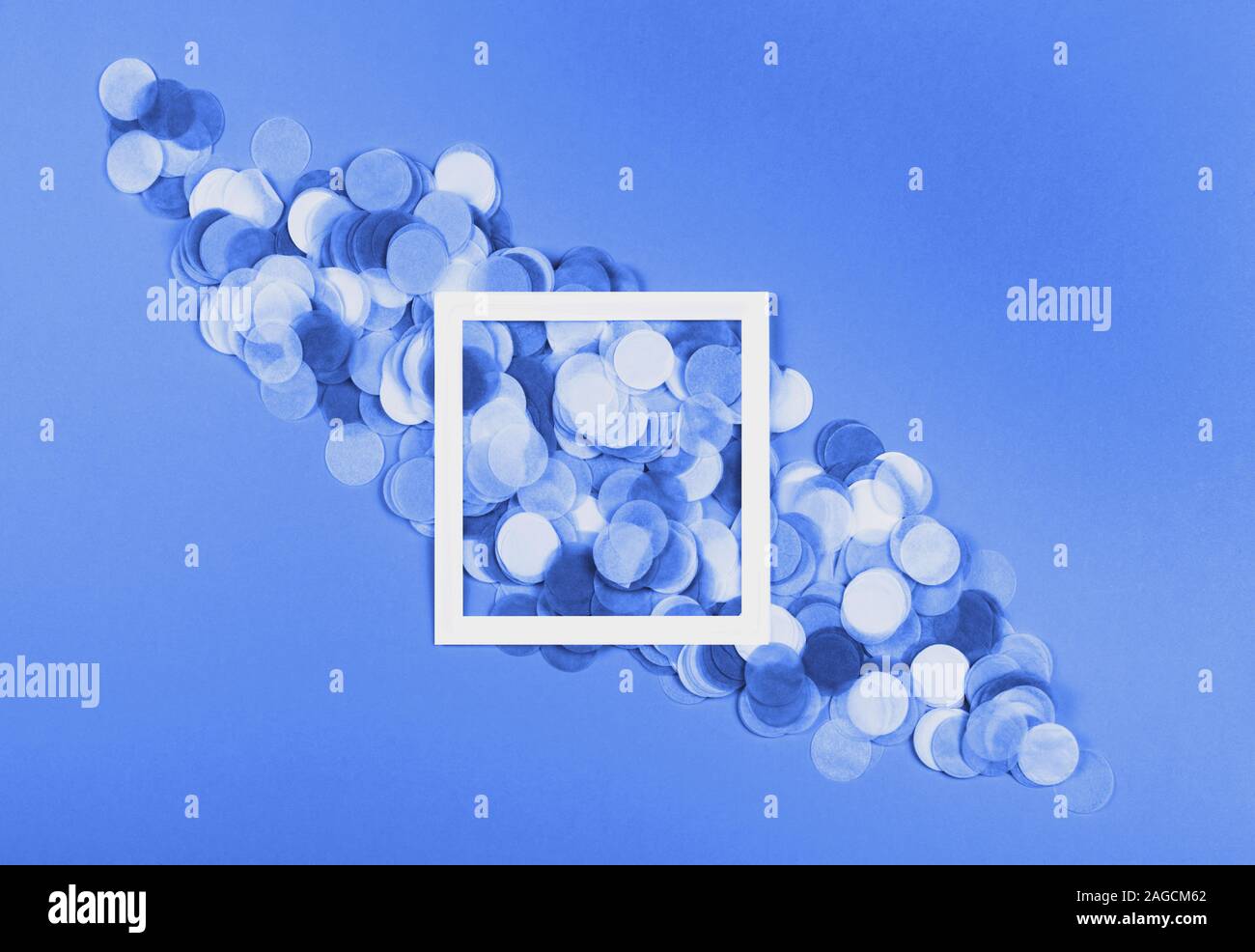 White frame on trendy background with confetti. Stock Photo