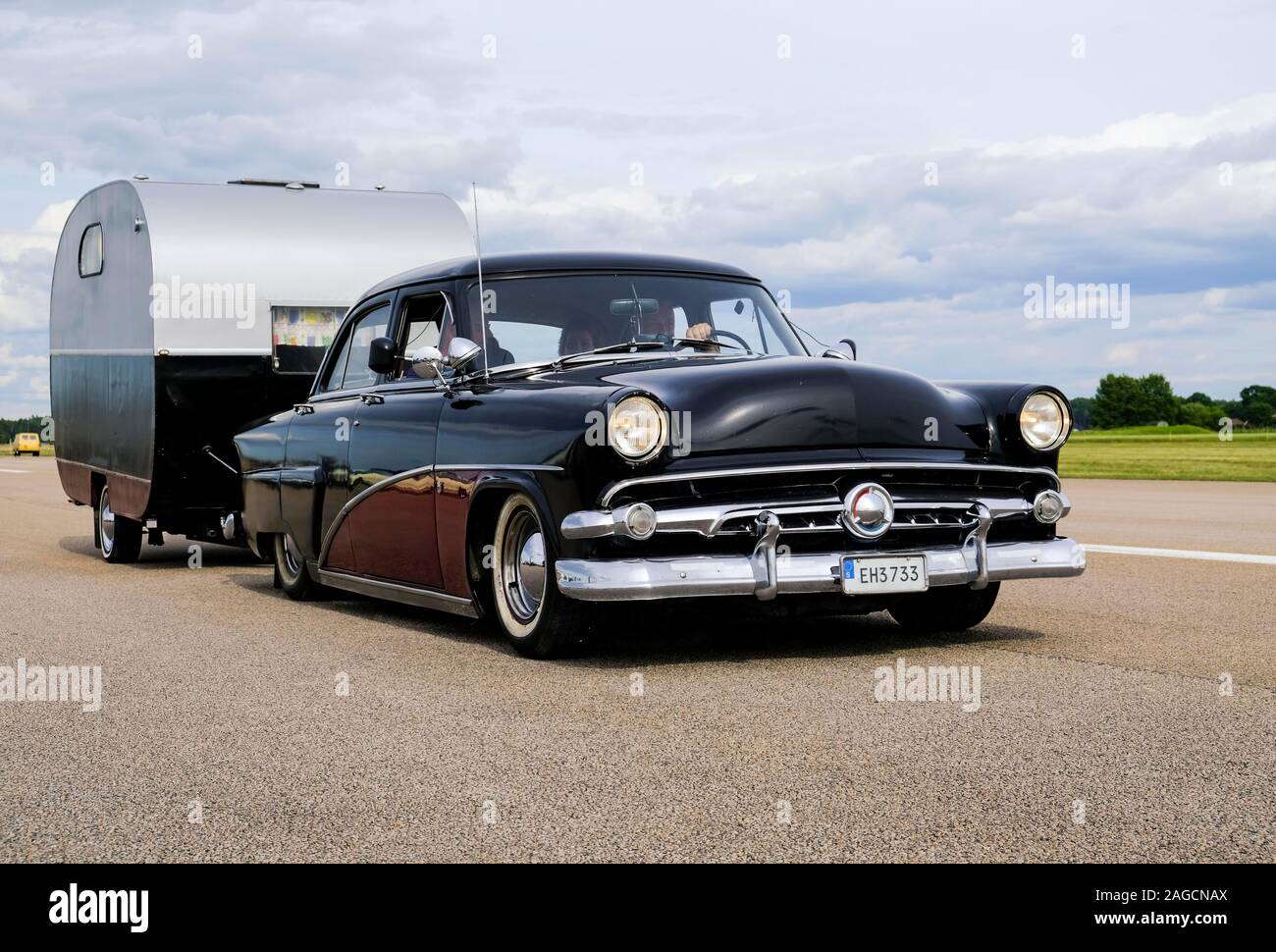 American vintage car, Ford 73A Mainline, built 1954, with retro caravan, at the vintage car meeting Powermeet 2017, Lidkoeping, Vaestra Goetaland Stock Photo