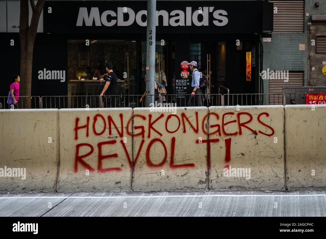 HongKong - November, 2019:   Graffiti reading 'Hongkongers revolt !' during the 2019 Hong Kong protests, a series of demonstrations in Hongkong Stock Photo