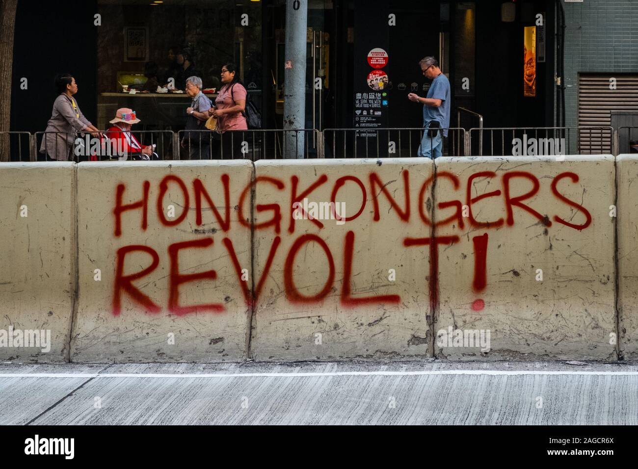 HongKong - November, 2019:   Graffiti reading 'Hongkongers revolt !' during the 2019 Hong Kong protests, a series of demonstrations in Hongkong Stock Photo