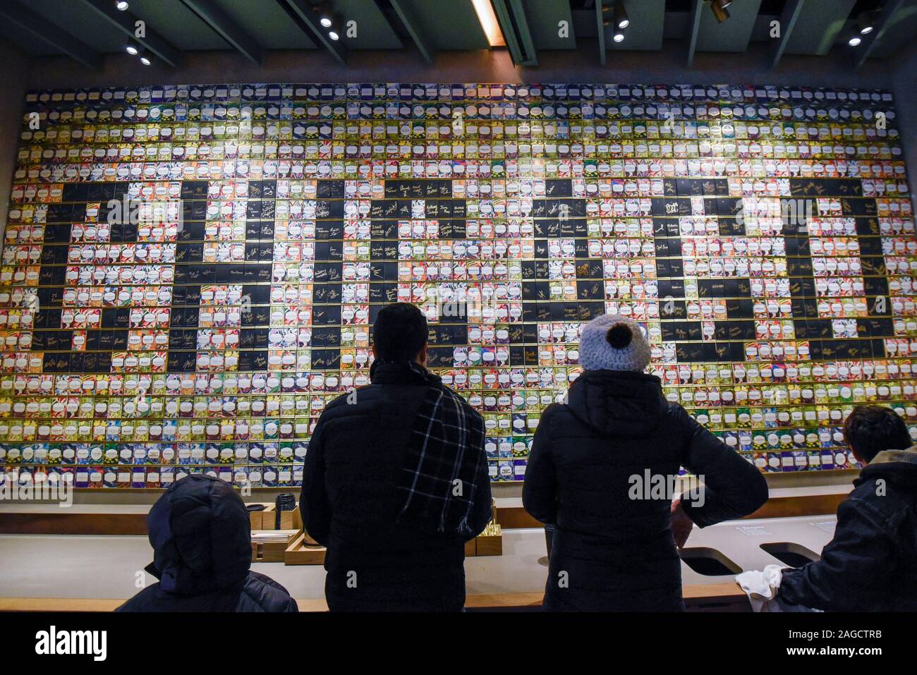 Chicago, USA.  18 December 2019.  The card wall in the recently opened Chicago Roastery, the world's biggest Starbucks on Michigan Avenue.  The rarest coffees that the company provides are on offer in a Starbucks Reserve Roastery which, over four floors, presents the story of coffee from bean to cup, an Italian bakery, an experiential coffee bar and a coffee inspired cocktail bar.  Credit: Stephen Chung / Alamy Live News Stock Photo