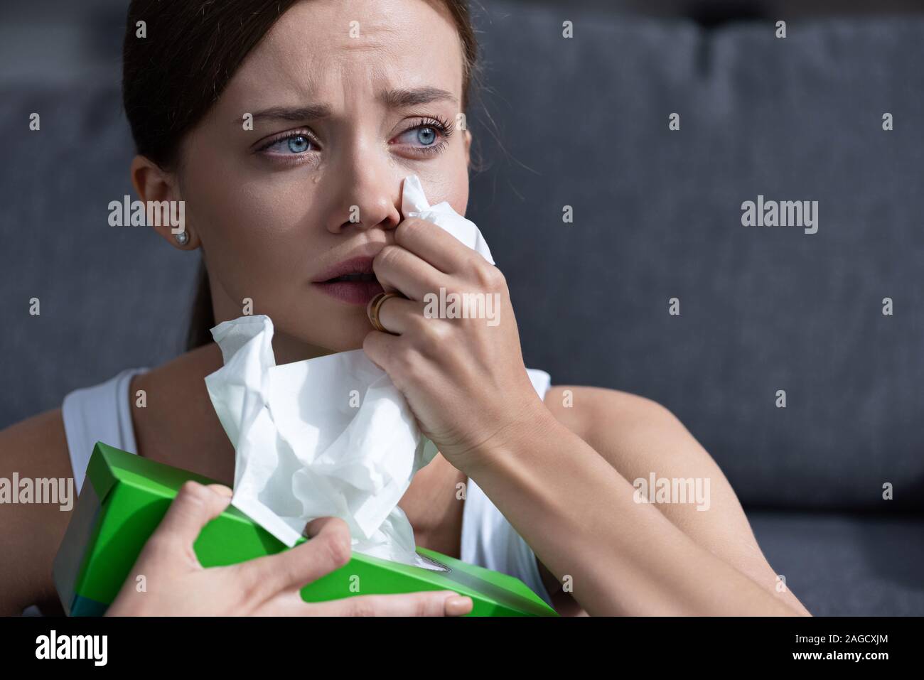 Wiping away tears hires stock photography and images Alamy