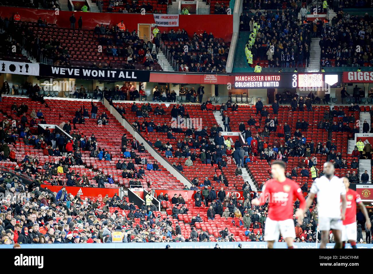 Empty seats around the ground towards the end of the Carabao Cup quarter final match at Old Trafford, Manchester. Stock Photo