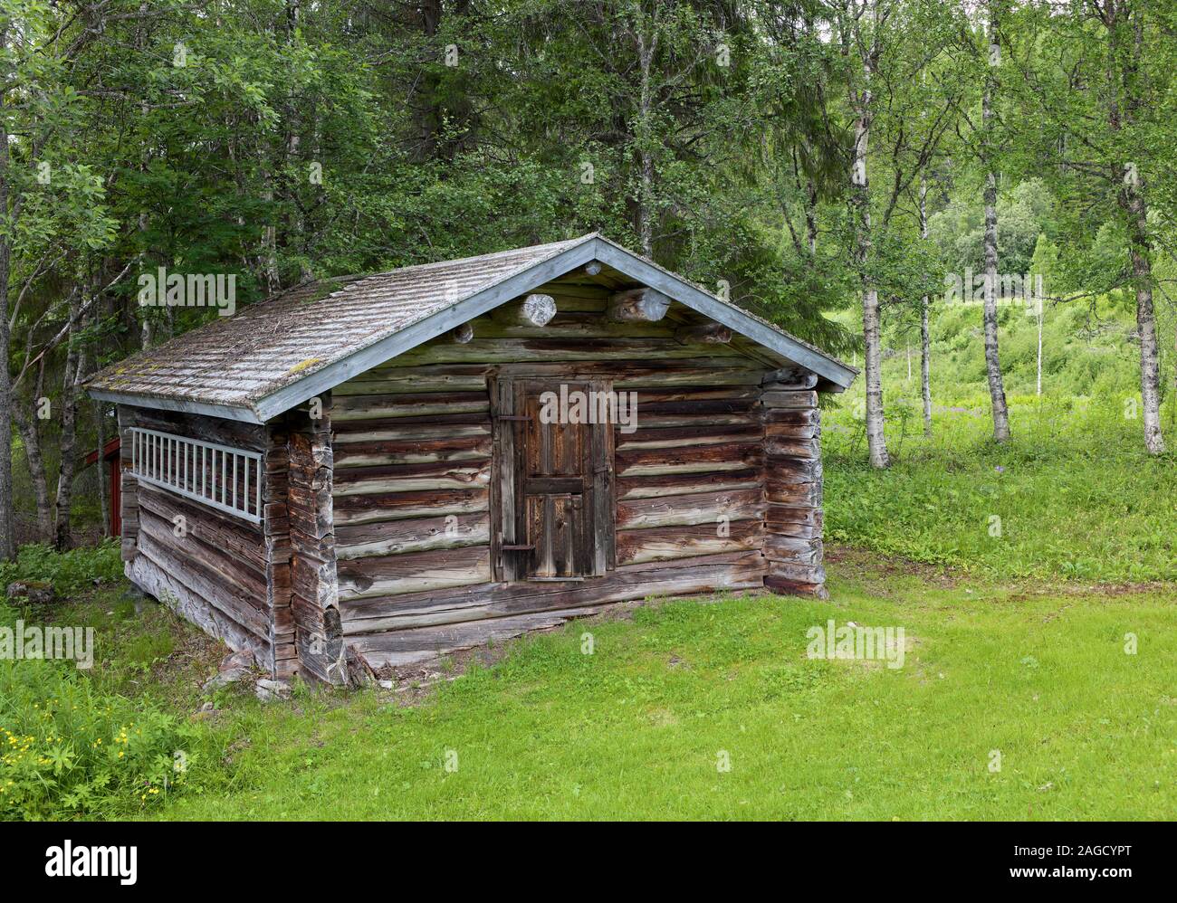Wooden cottage next to Viken Chapel, Viken, near Gäddede, Sweden Stock Photo