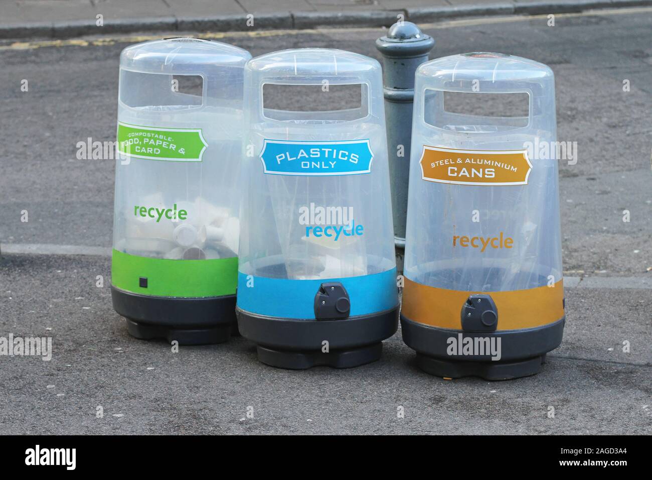 Three transparent plastic containers for waste sorting Stock Photo - Alamy