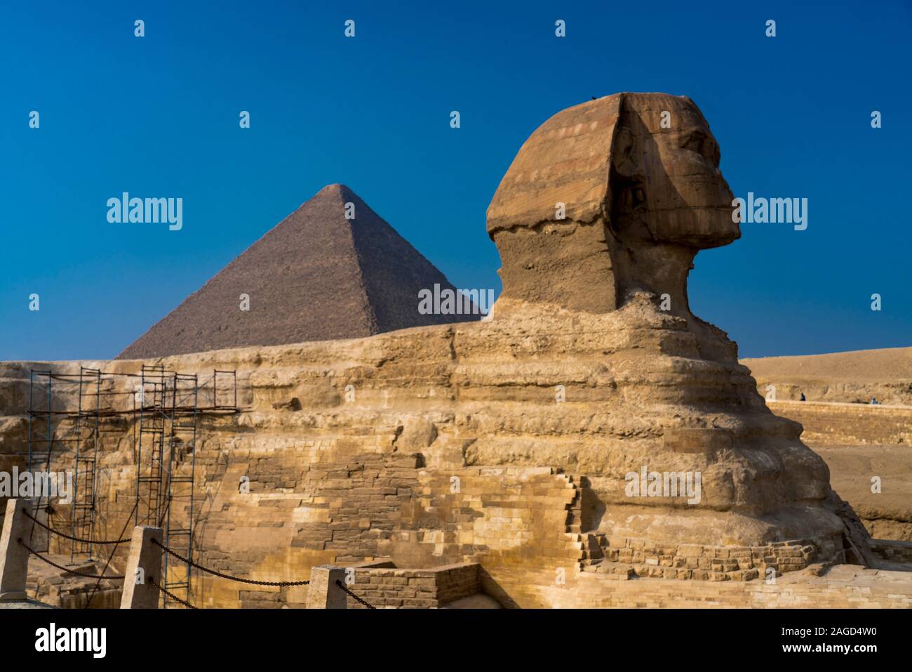 NOVEMBER 2019, CAIRO EGYPT, Sphinx with view  of the Great Pyramids of Giza, Cairo, Egypt Stock Photo