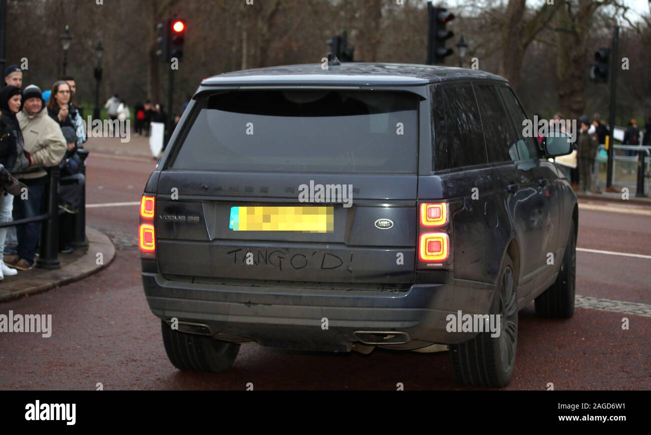 London, UK. 18th Dec, 2019. Somebody has written TANGO'D in the dirt on the Land Rover driven by Lady Helen Taylor, husband Timothy and daughter Estelle, who were amongst the guest leaving the party as members of the Royal family attend HM Queen Elizabeth II's annual Christmas lunch, at Buckingham Palace, London, on December 18, 2019. Credit: Paul Marriott/Alamy Live News Stock Photo