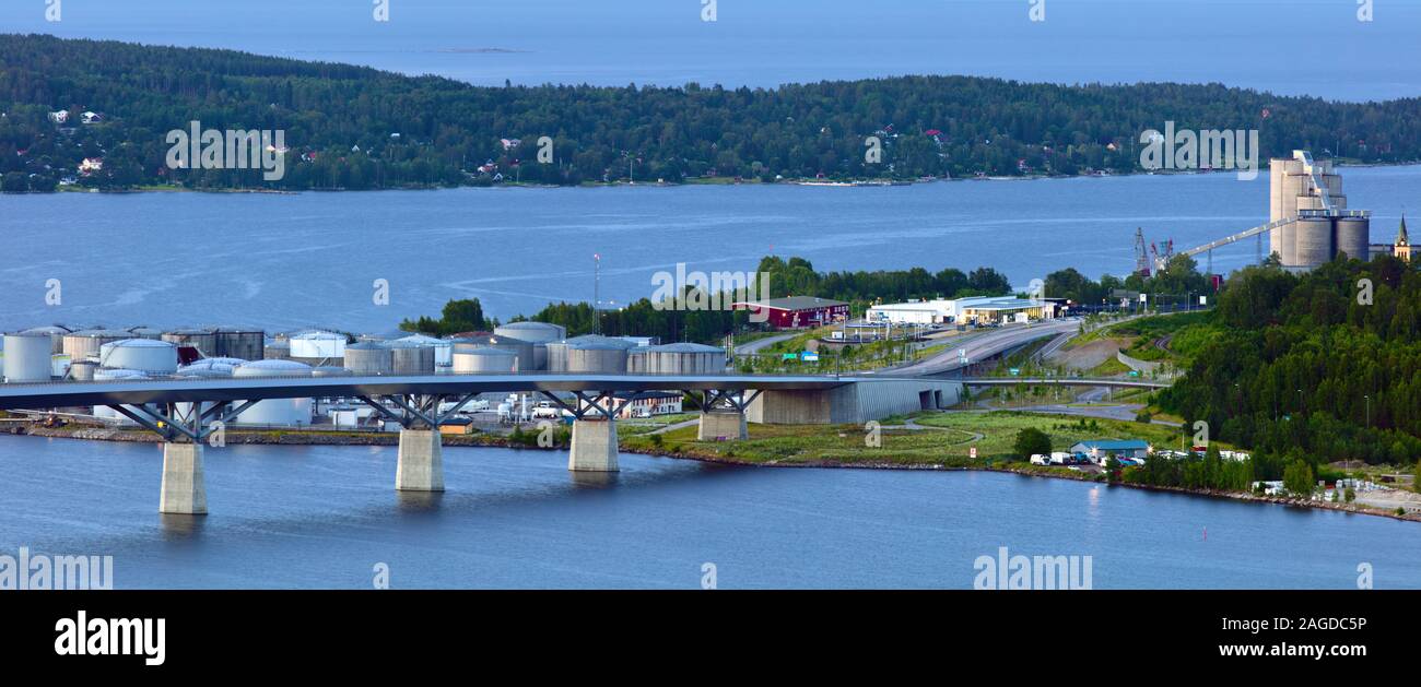 Sundsvall bridge with an oil harbor behind in Sundsvall, Sweden Stock Photo