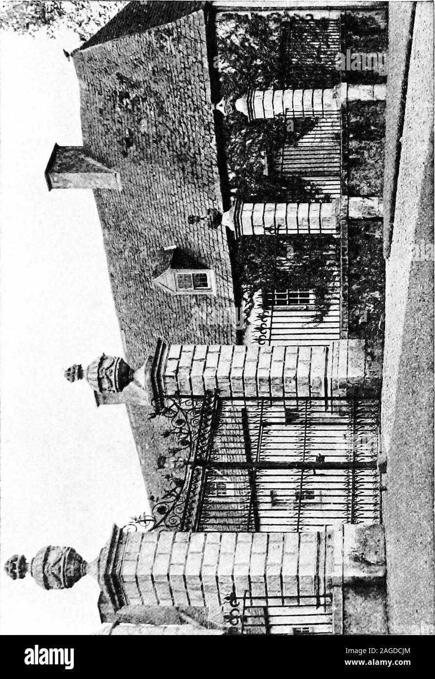 . English ironwork of the XVIIth & XVIIIth centuries; an historical & analytical account of the development of exterior smithcraft. FIG. 9. DETAILS OF COWDRAY GATES. Fore-Court and Garden Gates 25. Q&lt;! I-! oo E- en &lt; g a &lt;i E-O Eh O 26 English Ironwork of the XVIIth and XVIIIth Centuries gates to Kew Gardens. Entrance gates have always presented,favoured sites for coats of arms, which denote at once the familyand rank of the owner. The shields were at first merely supportedby a pair of scrolls, but the tendency developed towards a richertreatment. Few now exist, and as the lowered cen Stock Photo