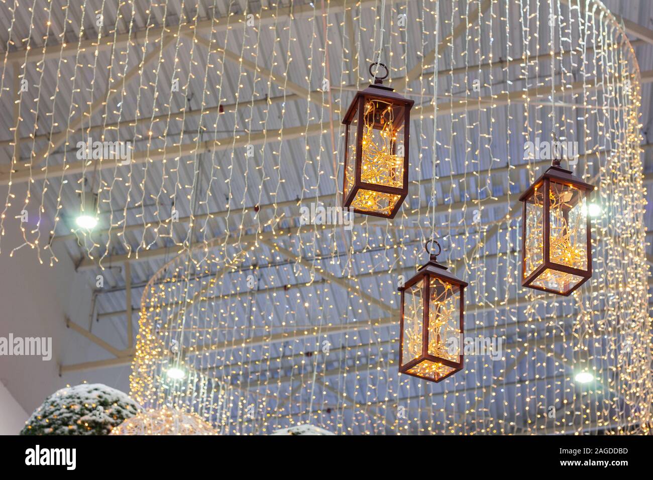 three fabulous lantern decorations and garland. Christmas interior ...