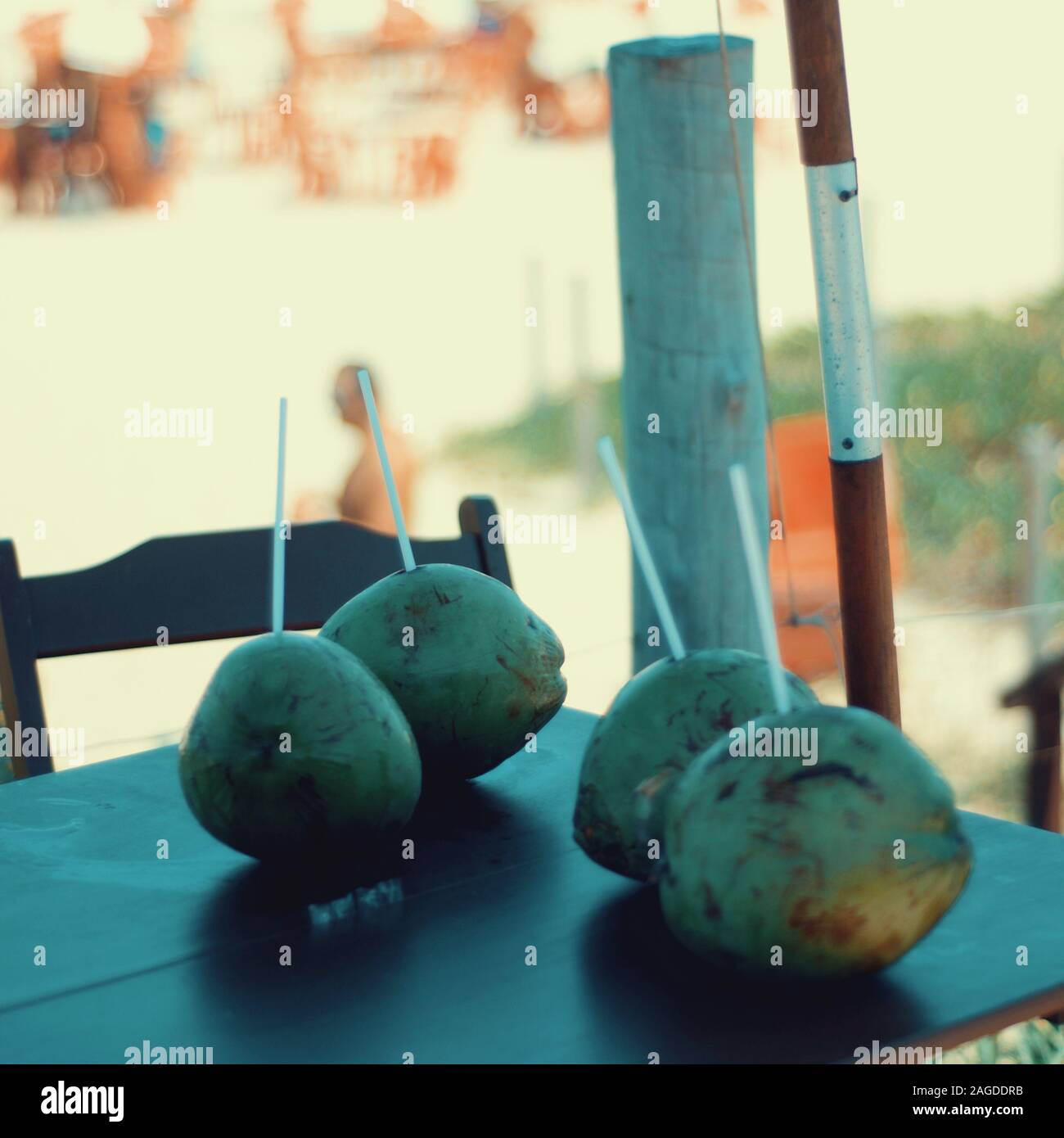 Closeup shot of coconuts on a table with a blurred background  in Brazil Stock Photo