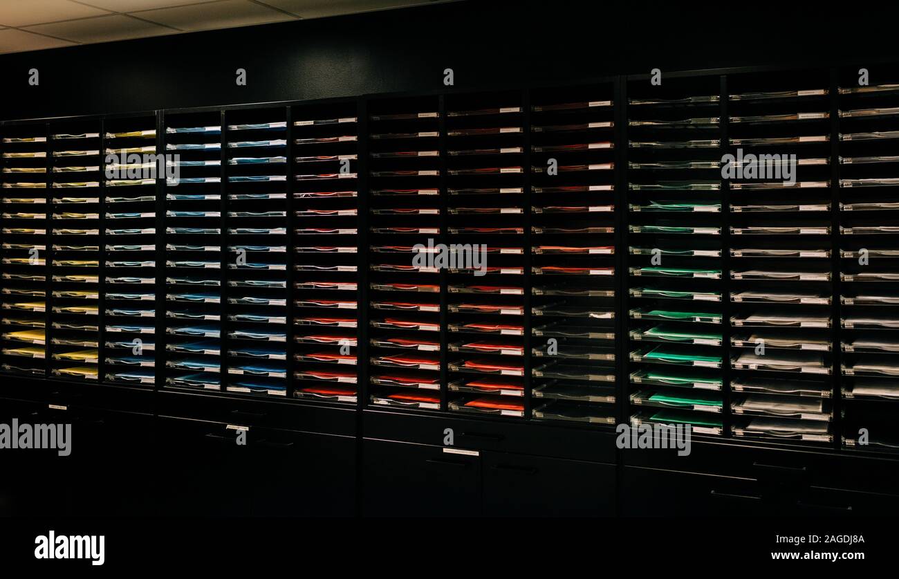 colour coordinated filing room in an office Stock Photo