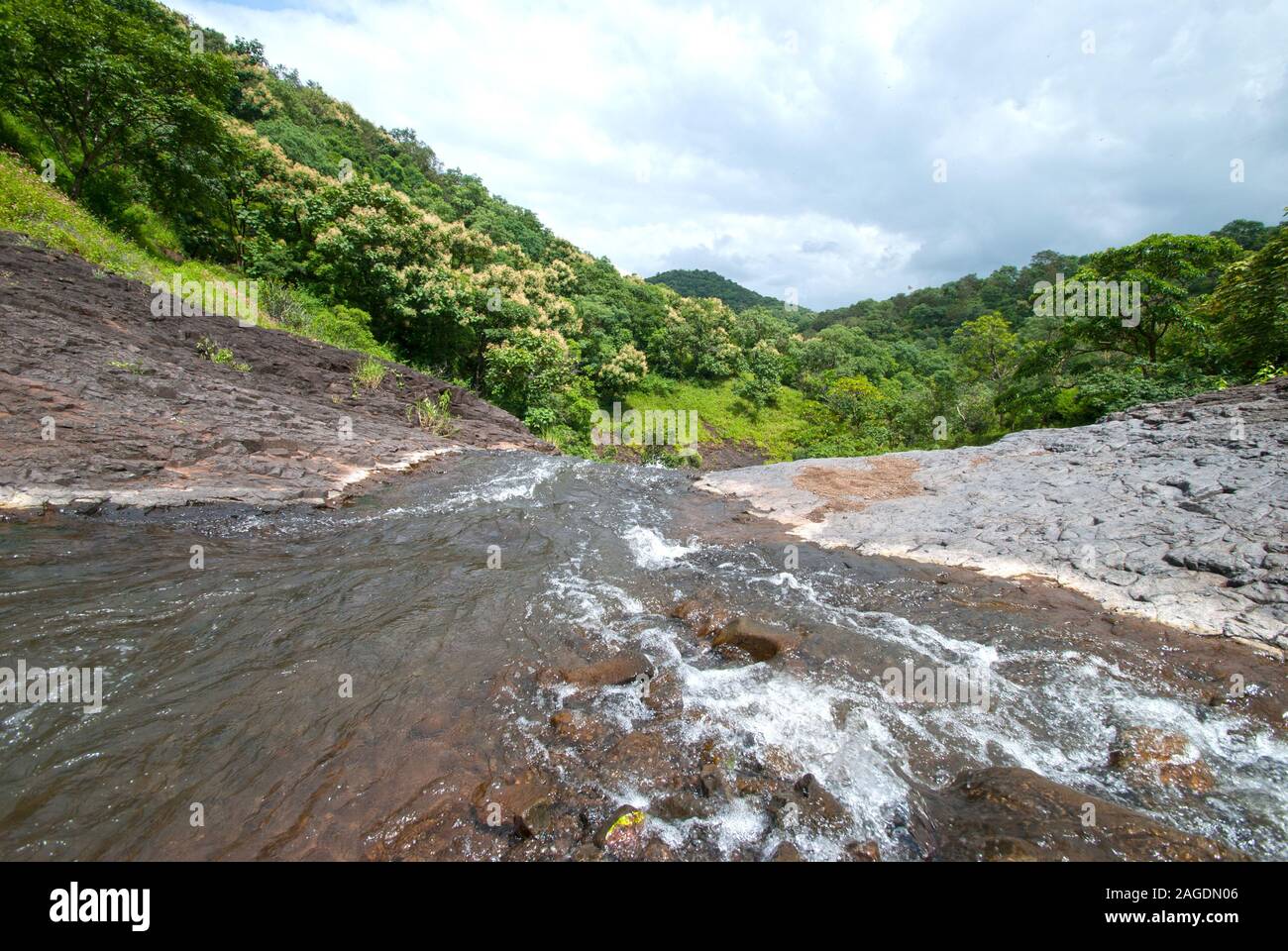 landscape with mountains trees and a river in front Stock Photo - Alamy