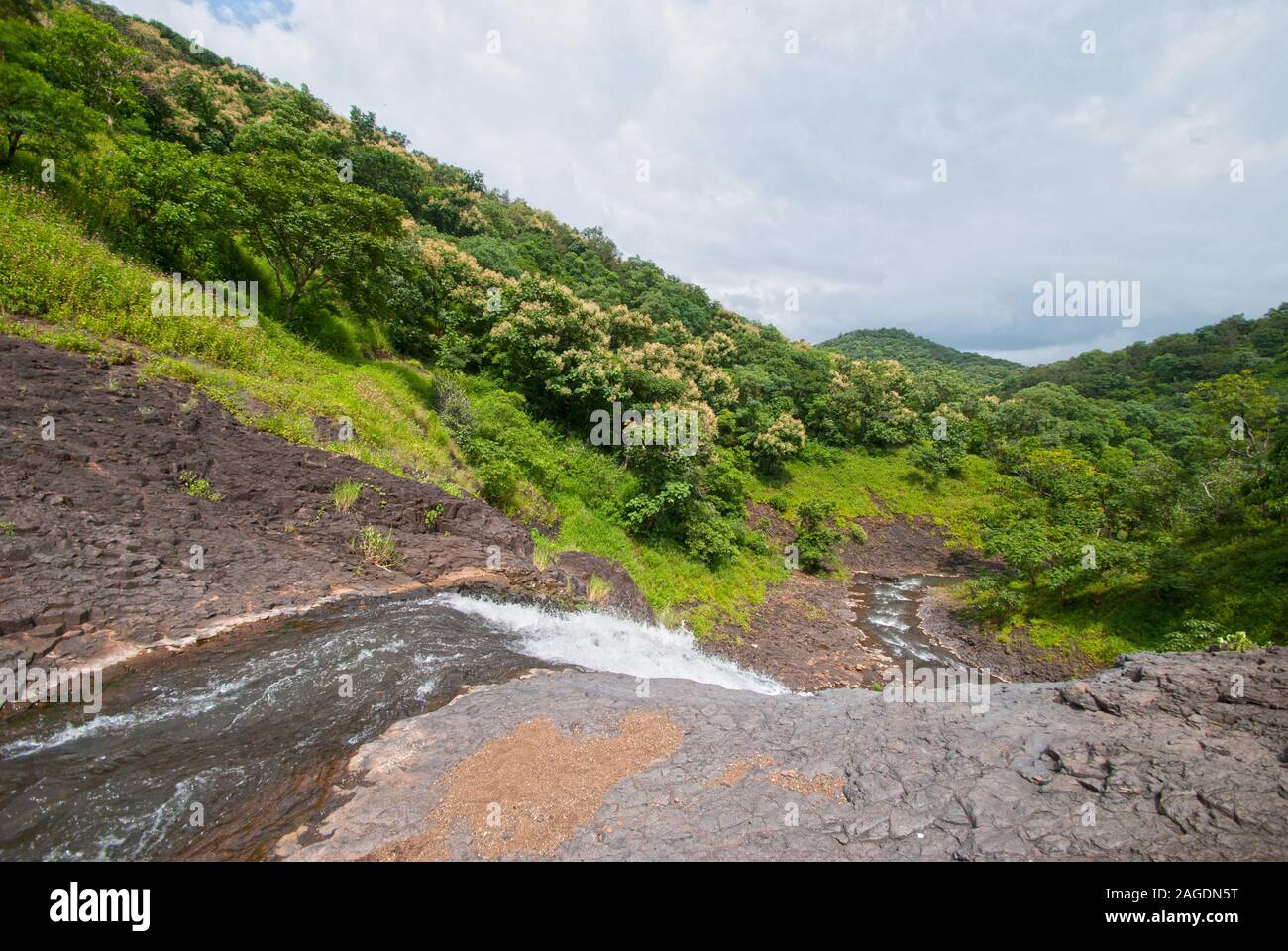 landscape with mountains trees and a river in front Stock Photo - Alamy