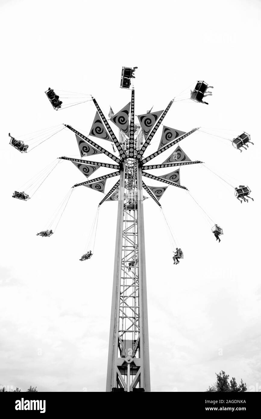 Aerial twirling ride at the Fair, US, 2015. Stock Photo