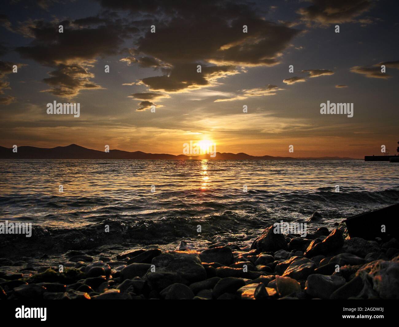 Beautiful scenery of the sunset reflecting in the sea - great for a ...