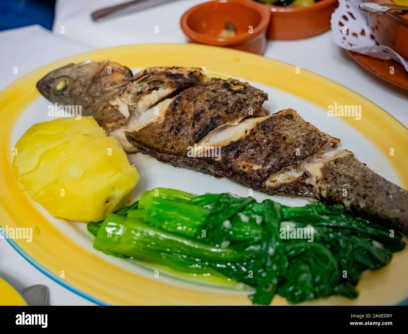 Close up shot of a plate of fried fish, ate at Macau, China Stock Photo