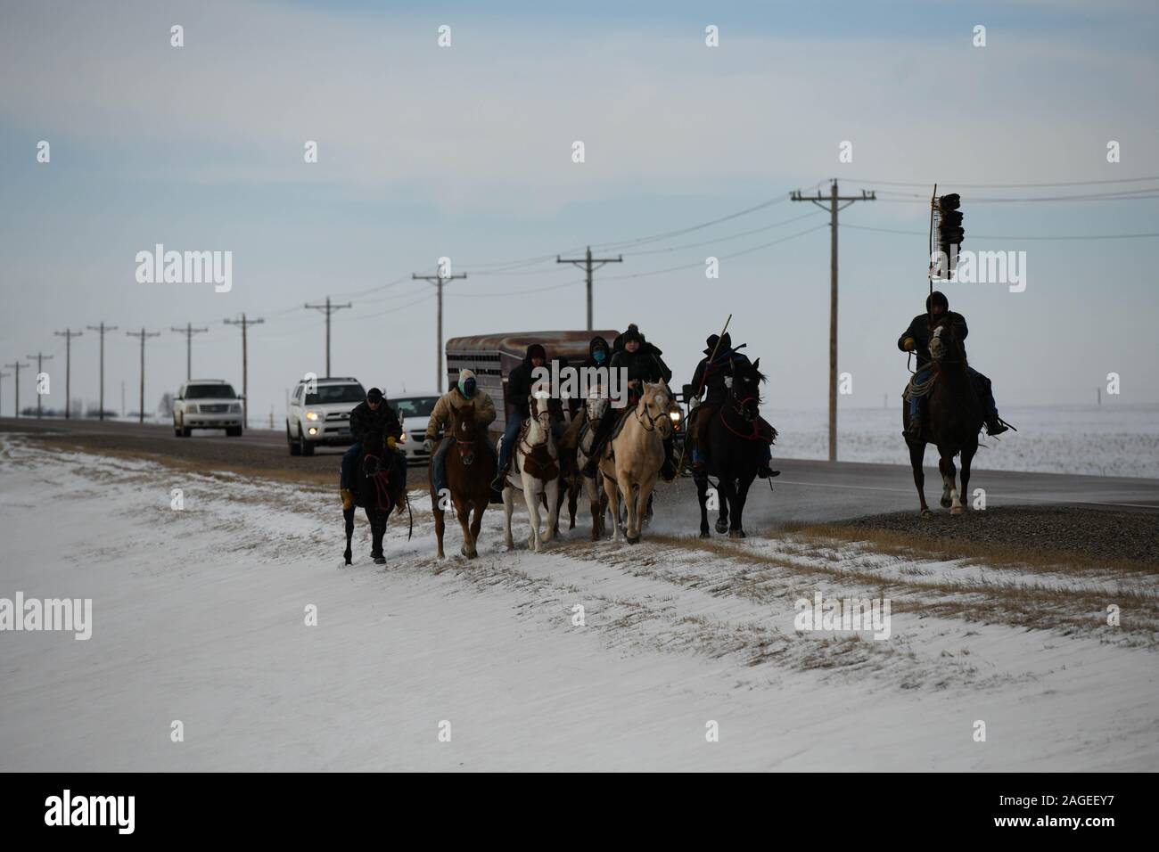 Pipestone, Minnesota, USA. 18th Dec, 2019. Riders on route 34 at the South Dakota-Minnesota border on Wednesday, the 8th day and 167 mile of a 325-mile Dakota 38 2 Memorial Ride to Mankato, Minnesota, site of the largest mass execution in U.S. history. President Abraham Lincoln ordered the hanging of 38 Dakota Indians''”and later, two chiefs''”following their uprising against the U.S. government. Credit: ZUMA Press, Inc./Alamy Live News Stock Photo