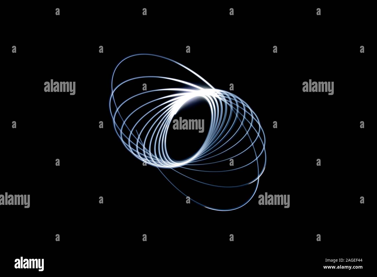 Illustration of a blue light spiral trail on a black background - great ...
