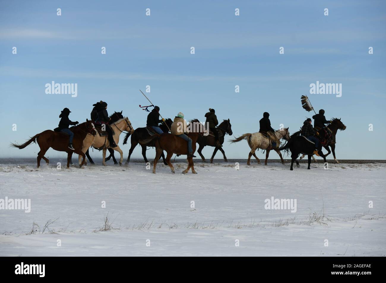 Pipestone, Minnesota, USA. 18th Dec, 2019. Riders on route 34 at the South Dakota-Minnesota border on Wednesday, the 8th day and 167 mile of a 325-mile Dakota 38 2 Memorial Ride to Mankato, Minnesota, site of the largest mass execution in U.S. history. President Abraham Lincoln ordered the hanging of 38 Dakota Indians''”and later, two chiefs''”following their uprising against the U.S. government. Credit: ZUMA Press, Inc./Alamy Live News Stock Photo