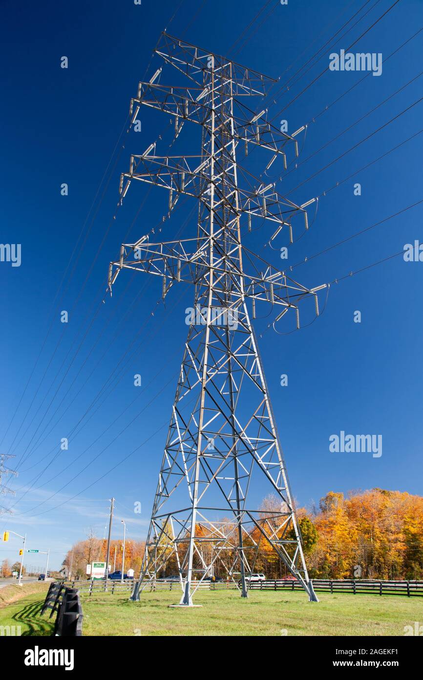 tower of electrical high voltage power on blue sky Stock Photo - Alamy
